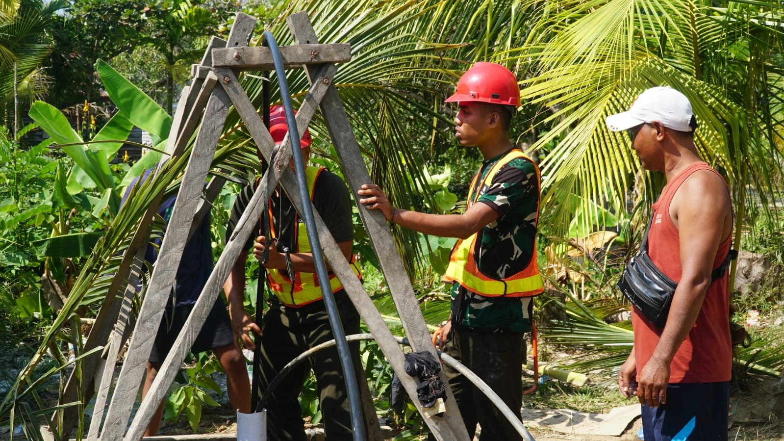 Kolaborasi Satgas TMMD dan Masyarakat Dalam Pengelolaan Sumur Bor di Desa Bandar Raya