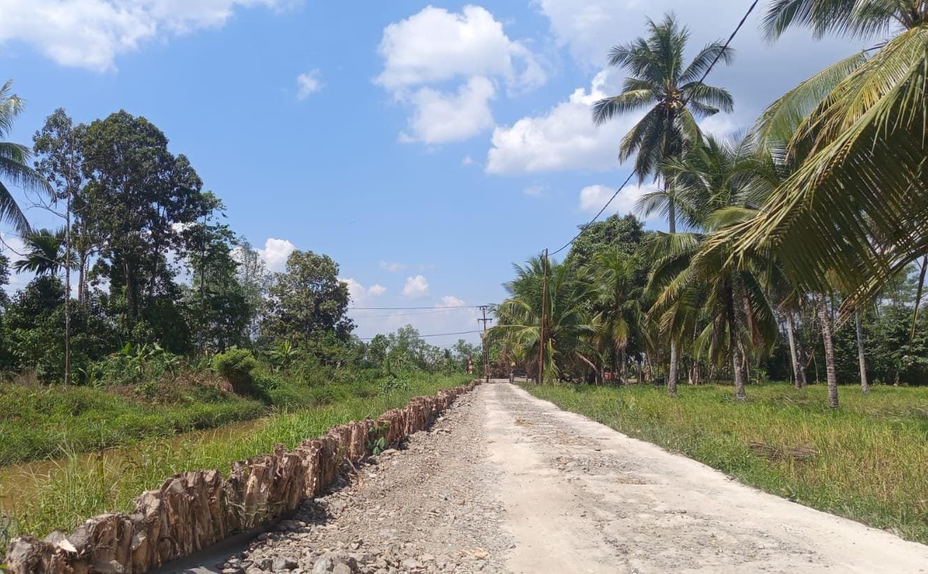 Peningkatan Jalan TMMD Ke-129 Dorong Perekonomian Desa Bandar Raya